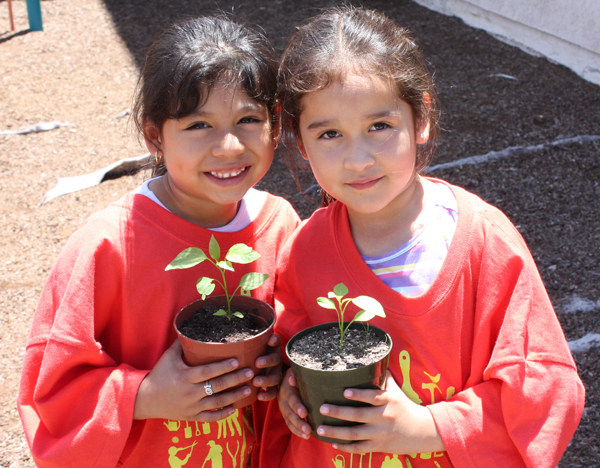 NeighborWorks Week 2009 girls with plants NeighborWorks Week 2009 girls with plants